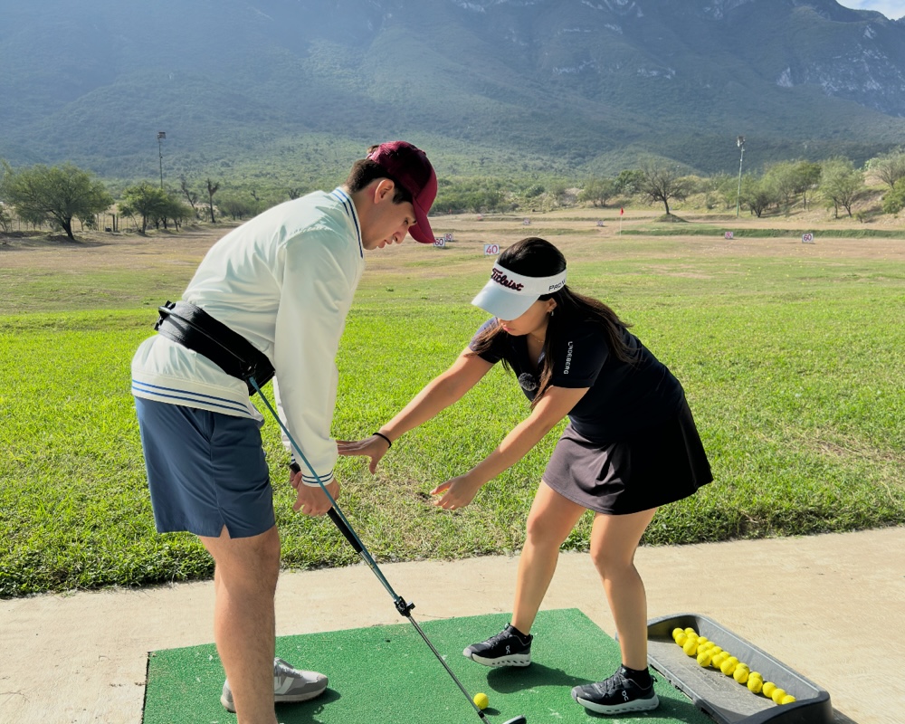 Putter y pelota de golf